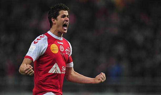 REIMS, FRANCE - MARCH 02: Anthony Weber of Stade de Reims Champagne celebrates victory during the Ligue 1 match between Stade de Reims Champagne v Paris Saint-Germain FC at Stade Auguste Delaune on March 2, 2013 in Reims, France. (Photo by Jamie McDonald/Getty Images)